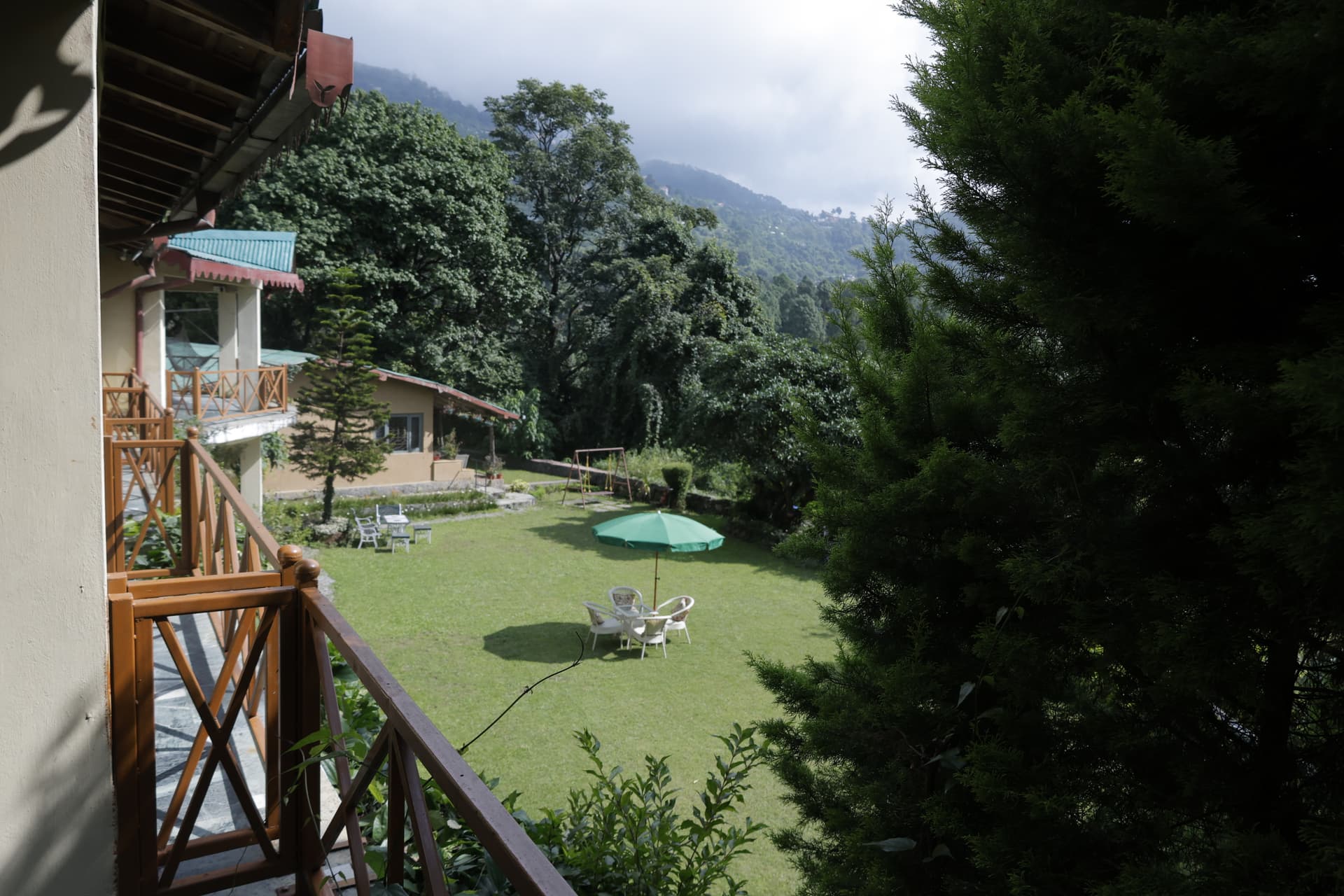 Panoramic hill view from window at Green Glen — Sattal, Uttarakhand